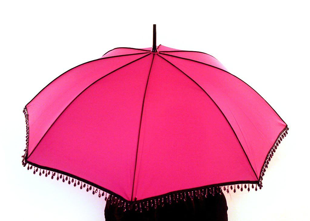 pink umbrella with black bead trim