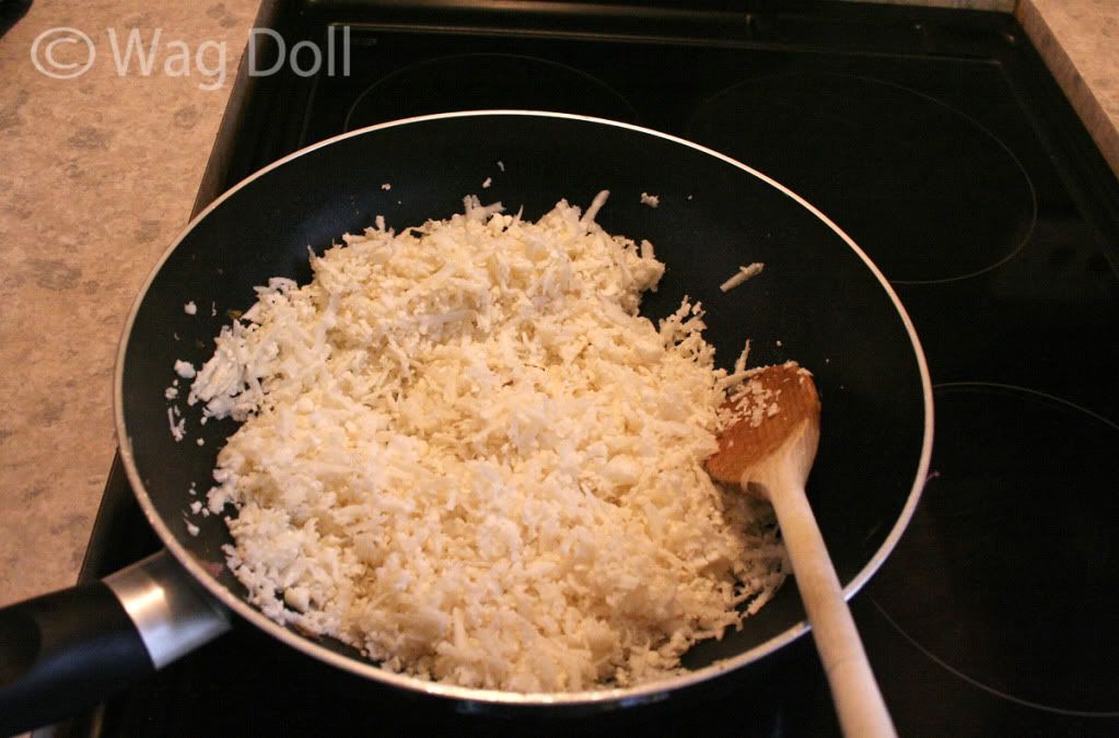 grated cauliflower in frying pan