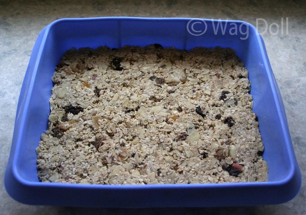 oat biscuit mixture in baking tray